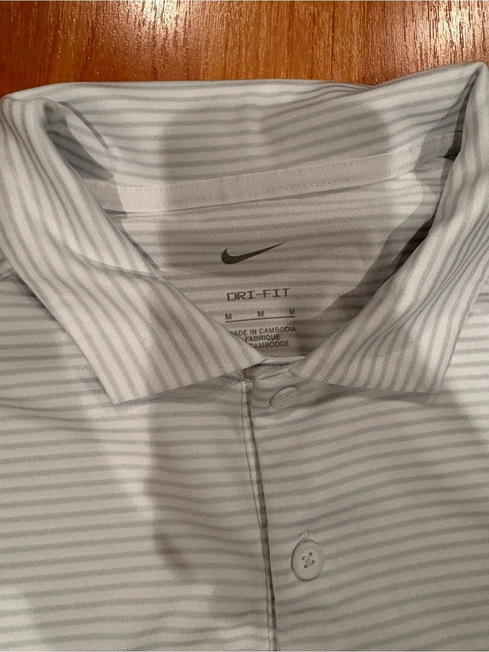 Nike White Polo with Thin Gray Stripes and Black Swoosh